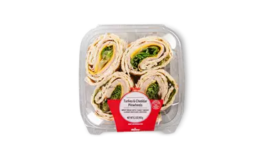 Turkey and cheese pinwheels with visible layers of meat and cheese